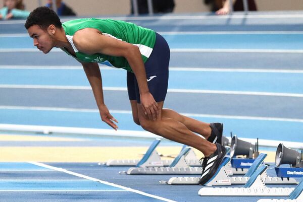 Runo Ayvoro (Newbridge) stuck in the blocks after a false start in the men's 60m heats