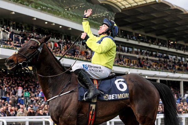 Sean Flanagan looks to the skies after winning the BetMGM Queen Mother Champion Chase on Marine Nationale Photo: ©INPHO/Tom Maher
