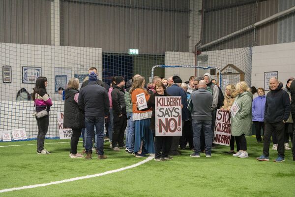 The group gathered inside the hall 