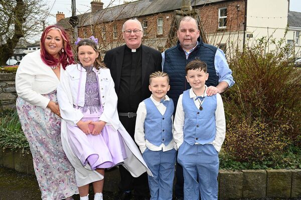 Alanna O'Neill with her family and parish priest Fr Liam Merrigan Alanna O'Neill with her family and parish priest Fr Liam Merrigan