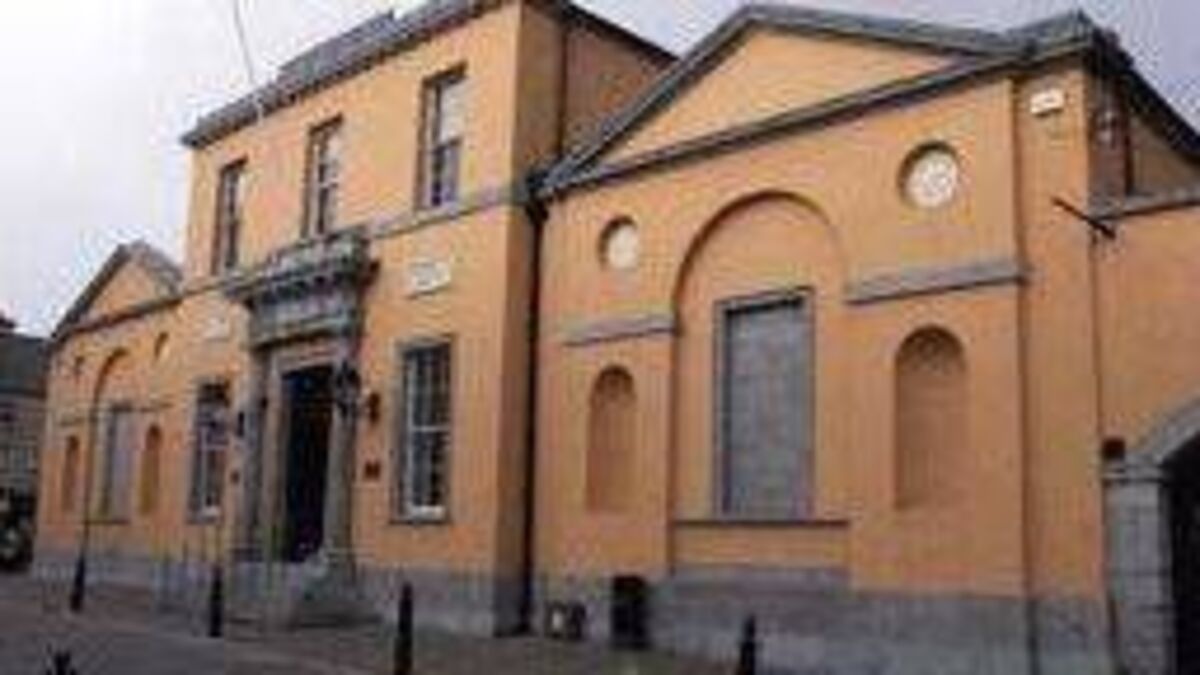 Woman charged with stealing €2 package of biscuits