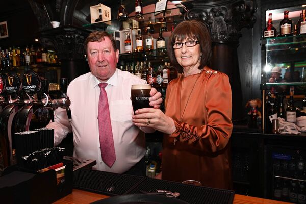 Gerry and Annette Roche serving a pint 