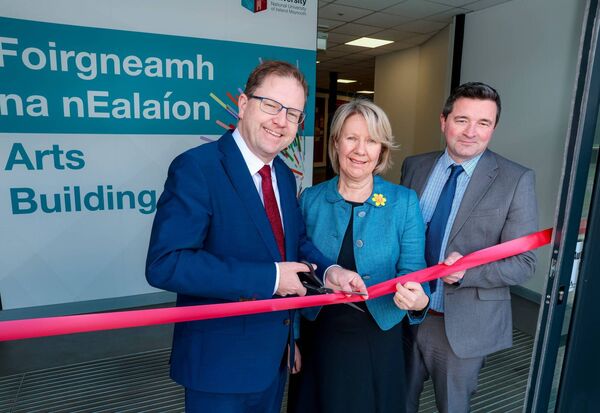 Minister James Lawless, MU President Prof Eeva Leinonen and Jonathan Glendinning, MU Head of Campus &amp; Commercial Services, cutting the ribbon on the refurbished Arts Building