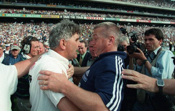 Mick O'Dwyer and Paidi O'Se embrace after Kildare's All-Ireland semi-final win over Kerry in 1998 Photo: Inpho/Billy Strickland