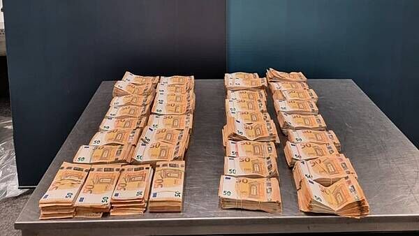 Man and woman (60s) arrested as gardaí seize €342,000 in cash at Dublin Airport