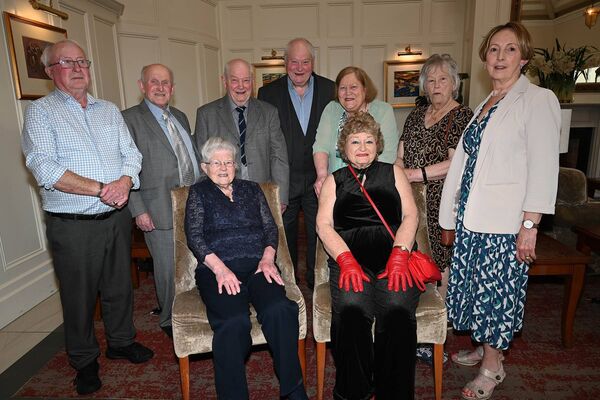 Sheila Sheridan celebrating her 80th with family members 