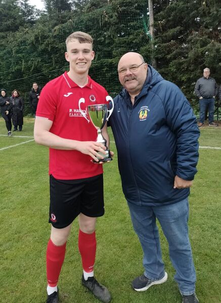 Cup final man of the match Conor Walsh receives his award