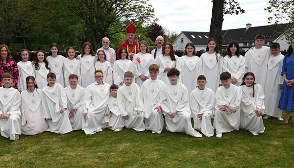 Confirmation class at Our Lady Victories Church Kildangan with Principal Irene Redmond Principan, Fr Lockie Flanagan Bishop Denis Nulty Fr Adrian Carbery and teacher Emma Hewison 