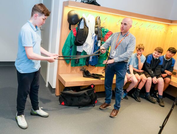 Paul Dunne from the Curragh Racecourse chats to students in the jockey weighroom