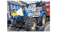 Tractor driver caught holding mobile phone on busy Kildare street