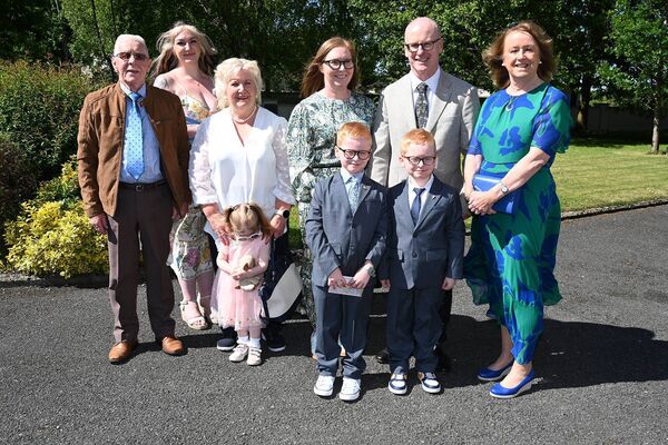 Twins Domhnall and Naoise Kinnane with family
