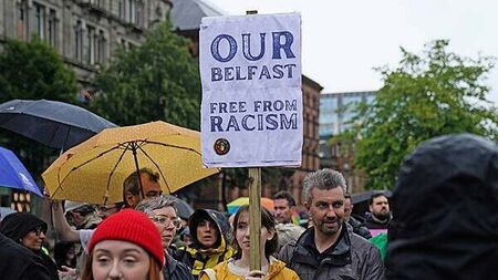Northern Ireland one petrol bomb away from a racist murder, Belfast rally hears