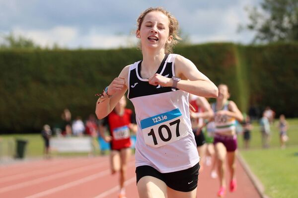 Iris McCartan crosses the line for gold in the 800m u14 Photo: Perri Williams Iris McCartan crosses the line for gold in the 800m u14 Photo: Perri Williams