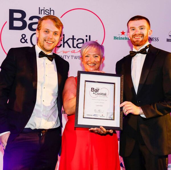 Pictured Cameron Wakeling (originally from Leicester, UK, now living in Sallins) and Padraig Creighton (from Kill, Co. Kildare), both from Vi’s Bar at Lawlor’s of Naas, proudly accepting the Interior Design of the Year – Leinster award presented by Nicci Smith, Programme Director, Irish Bar and Cocktail Awards, at the recent inaugural Irish Bar and Cocktail Awards Photo: Athlone City Photography