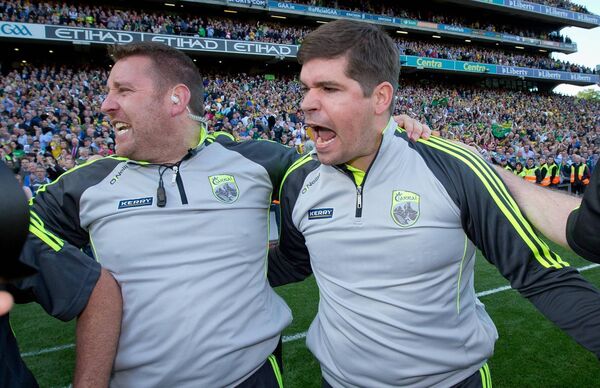Cian O'Neill celebrating with Kerry manager Eamonn Fitzmaurice after the 2014 All-Ireland final Photo: ©INPHO/Morgan Treacy