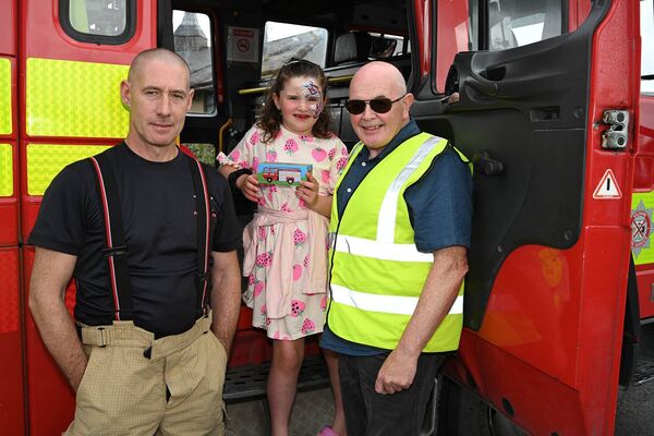 Martin Egan fire fighter and Ella and Paul Mason Martin Egan fire fighter and Ella and Paul Mason