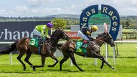 Keane lands treble at Naas