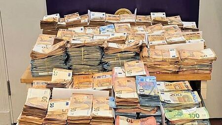 Three men arrested and almost €1.3m in cash seized in south Dublin
