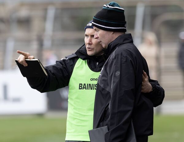 Brian Flanagan speaks with Damien Hendy on the sideline, establishing a strong management and background team was very important to the new manager Photo: Sean Brilly Brian Flanagan speaks with Damien Hendy on the sideline, establishing a strong management and background team was very important to the new manager Photo: Sean Brilly