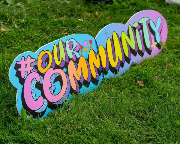 'Our community' sign posted at the event 'Our community' sign posted at the event