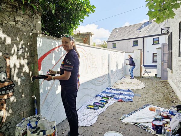 The community helped to paint the mural The community helped to paint the mural