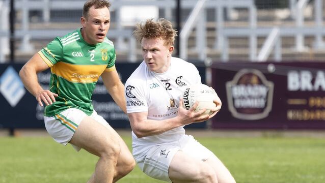 <p>Clane's Adam Fanning in possession</p>