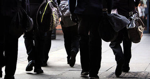 School secretaries and caretakers begin indefinite strike