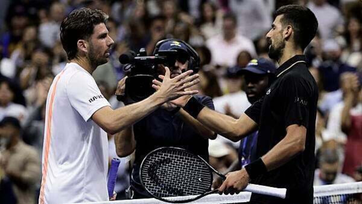 Novak Djokovic overcomes back issue to cruise past Cameron Norrie at US Open