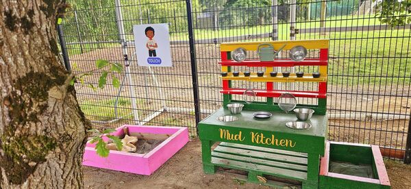 The mud kitchen in the garden The mud kitchen in the garden