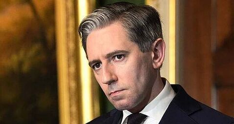 Woman arrested over serious online threats toward Simon Harris and his family