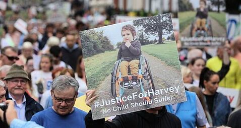 Minister receives report into care of boy who died after wait for spinal surgery