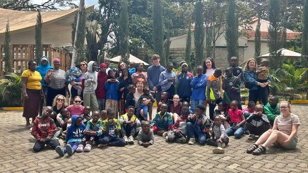 The volunteers at the summer camp with the children and some of the 'Mamas' The volunteers at the summer camp with the children and some of the 'Mamas'