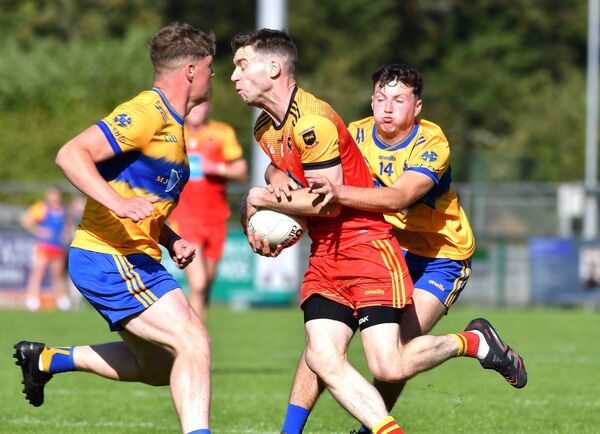 Evan Donnelly makes a strong challenge on Niall Clynch of St Laurences during Ellistown's preliminary round win Photo: Sean Brilly Evan Donnelly makes a strong challenge on Niall Clynch of St Laurences during Ellistown's preliminary round win Photo: Sean Brilly