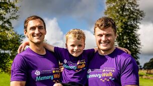 <p>Kildare rugby star Cian Prendergast and rugby commentator Murray Kinsella with 6-year-old Ruairí Brennan from Newbridge in support of the 2025 Alzheimer’s Memory Walk. Photo: Keith Wiseman</p>