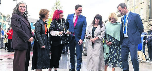 At the official reopening of Emily Square in Athy were minister for agriculture, food and the marine Martin Heydon (centre) with Sonya Kavanagh, chief executive of Kildare County Council, Orla Carroll of Fáilte Ireland, cathaoirleach of Kildare County Council Carmel Kelly, Bernie Roe of Eastern and Midland Regional Assembly, Ruth Andrews of Fáilte Ireland and cathaoirleach of Athy MD cllr Ivan Keatley Photo: Patrick Browne