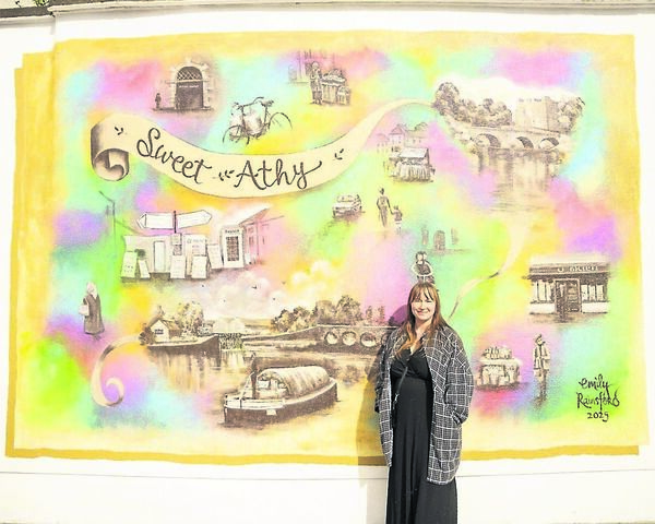 Emily Rainsford and her beautiful mural Emily Rainsford and her beautiful mural