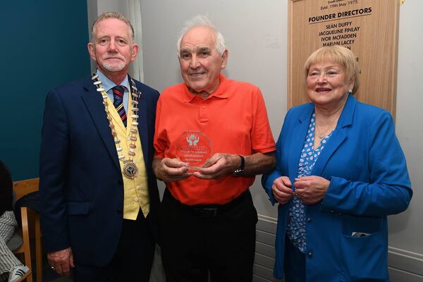 Brenden Jenkins President ILCU, Ger Brereton receiving plaque in honour of his late wife Margaret and Mary Ryan Chairperson Monasterevin CU Brenden Jenkins President ILCU, Ger Brereton receiving plaque in honour of his late wife Margaret and Mary Ryan Chairperson Monasterevin CU