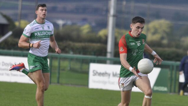 Suncroft's Eoghan Lawless on the run with Daragh Mangan of Sallins in hot pursuit during their sides' IFC quarter-final on Sunday in Manguard Park, Newbridge. All Photos: Martin Rowe <p>Suncroft's Eoghan Lawless on the run with Daragh Mangan of Sallins in hot pursuit during their sides' IFC quarter-final on Sunday in Manguard Park, Newbridge. All Photos: Martin Rowe </p>