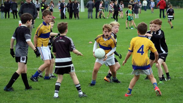 Some younger football players try out the new pitches