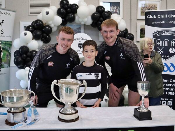 Kilcullen U10 player Fionn Gleeson meets county hurling stalwarts Darragh Melville (Leixlip) and James Burke (Naas)