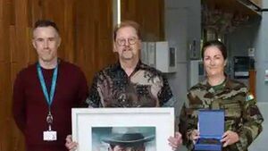 Kildare artist presents portrait of Michael Collins to Defence Forces