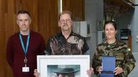 Kildare artist presents portrait of Michael Collins to Defence Forces