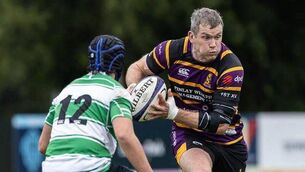 <p>Naas's Dylan O’Keeffe squares up to former Irish international, Instonian's Ian Whitten. Photo: Instonians RFC</p>