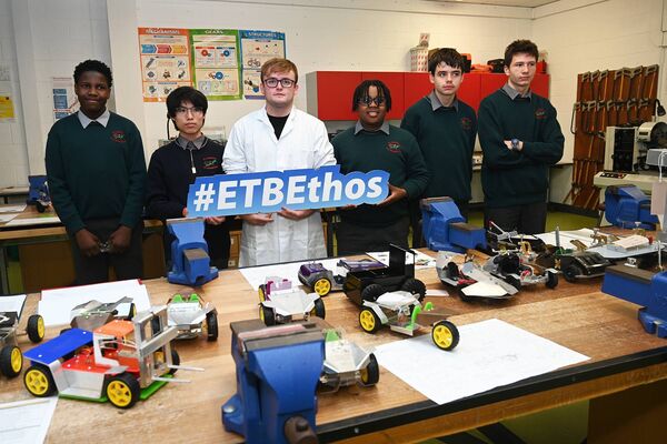 Students in the engineering room with Dylan Molundy Students in the engineering room with Dylan Molundy