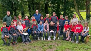 <p>Liam Queally (centre), Managing Director of Irish Dog Foods, pictured with pupils and teachers of 5th Class Scoil Bríd, Naas, at the ‘Tiny Forest’ initiative by Irish Dog Foods in partnership with Earthwatch Europe in conjunction with Kildare Co. Co. alongside Naas Biodiversity Group Photo: Tony Keane</p>