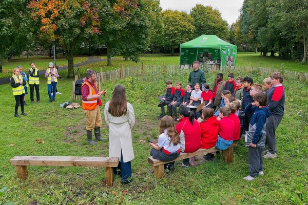 Researcher, Kevin Carolan, with Earthwatch Europe, with pupils and teachers from Scoil Bríd, Naas, 5th class, at the ‘Tiny Forest’ initiative by Irish Dog Foods in partnership with Earthwatch Europe in conjunction with Kildare Co. Co. alongside Naas Biodiversity Group, Wednesday, 1st October, 2025, at Monread Park, Naas.