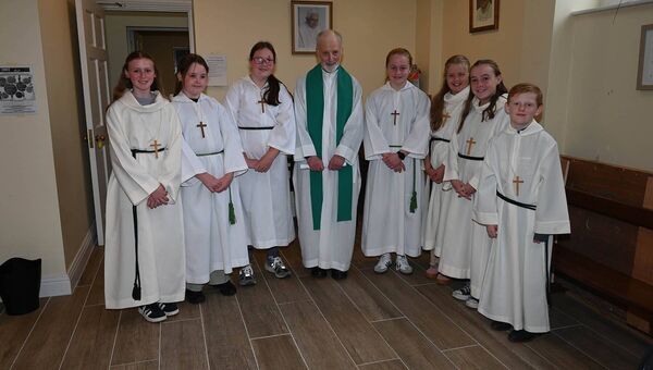 Fr John with his alter servers 