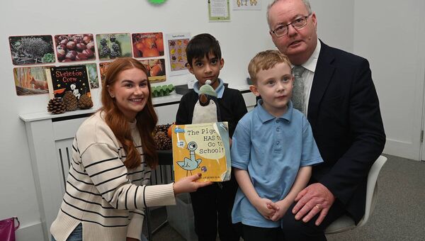 Teacher Orla Mulreid with Usayd Hisham Charlie Warren-Keating and Minister Michael Moynihan Teacher Orla Mulreid with Usayd Hisham Charlie Warren-Keating and Minister Michael Moynihan