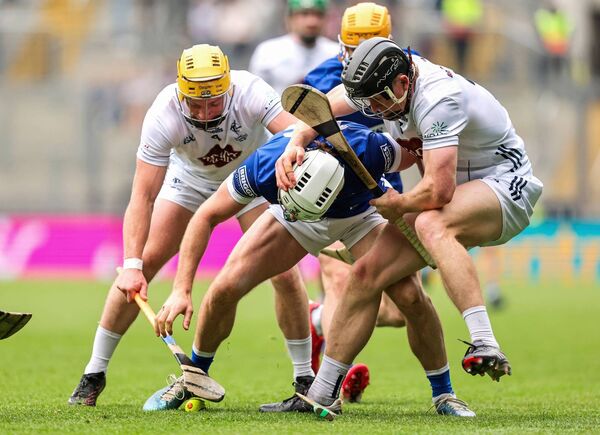 Simon Leacy and Rian Boran putting Ben Conroy of Laois under pressure during the McDonagh Cup final Photo: ©INPHO/Bryan Keane Simon Leacy and Rian Boran putting Ben Conroy of Laois under pressure during the McDonagh Cup final Photo: ©INPHO/Bryan Keane