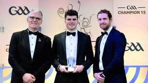 <p>Joe McDonagh Cup Player of the Year Cian Boran of Kildare is presented with his award by Uachtarán Chumann Lúthchleas Gael Jarlath Burns, left, and GPA Chief Executive Officer Tom Parsons, right, during the GAA Champion 15 Awards ceremony at Croke Park in Dublin. Photo by Brendan Moran/Sportsfile </p>